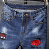 DENIM Ripped Jeans With Rose Patch